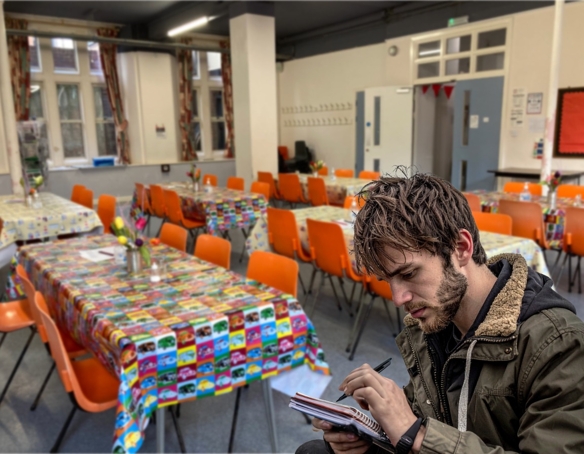 Bury Drop In guest making a list for survival.